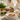 older couple at table with breakfast items