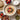 Talbina with fruit topping and ingredients around bowl