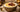 Talbina in a bowl with dates and nuts on top