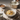 Talbina in bowl with toppings and milk nearby